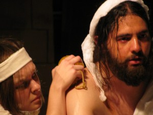 Simone washes MARAT in Marat Sade at California Stage